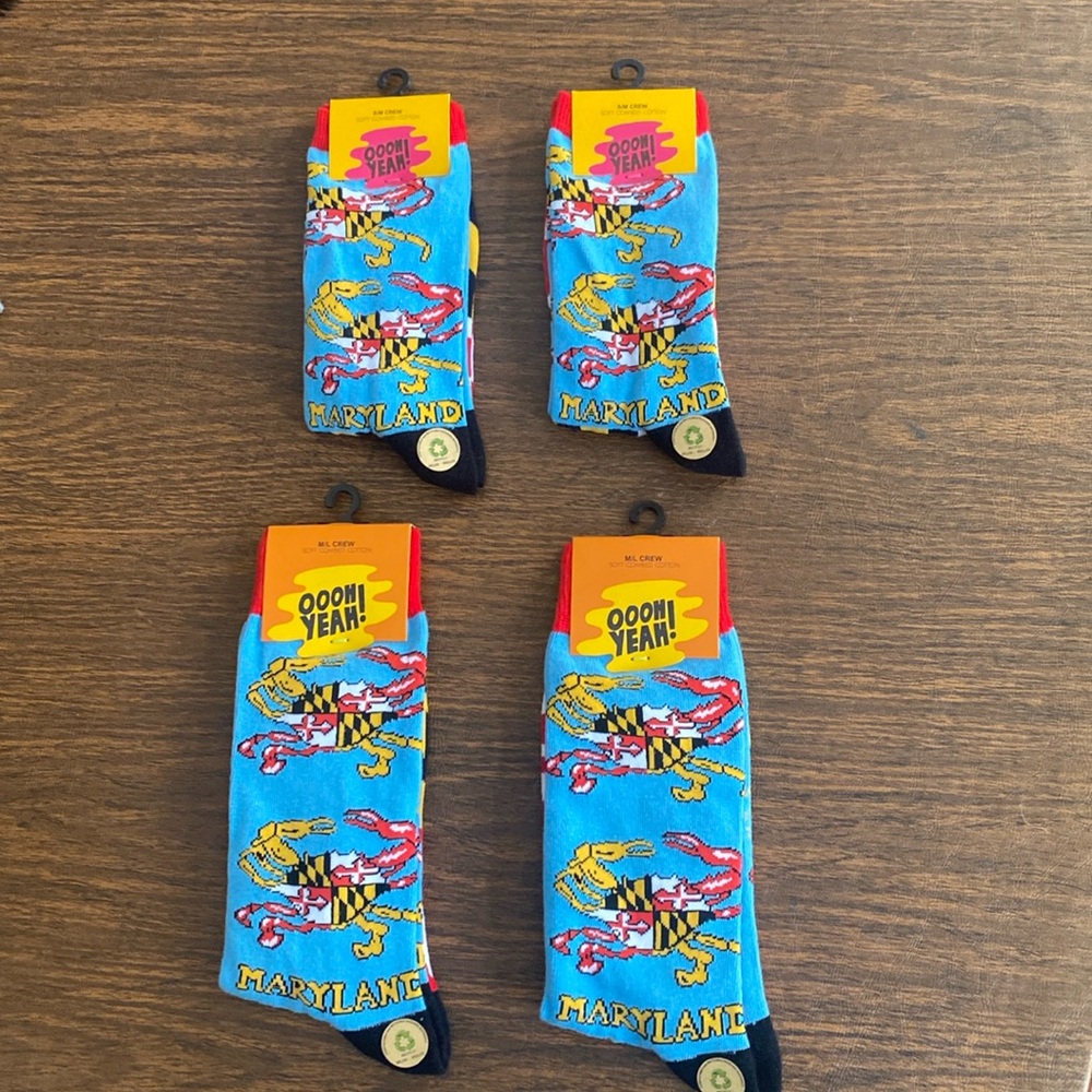 Socks with Maryland flag and flag crabs. 2 women’s and 2 men’s